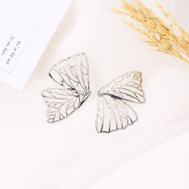 Boucles d'Oreilles Papillon Sculpté 26g Design Creux