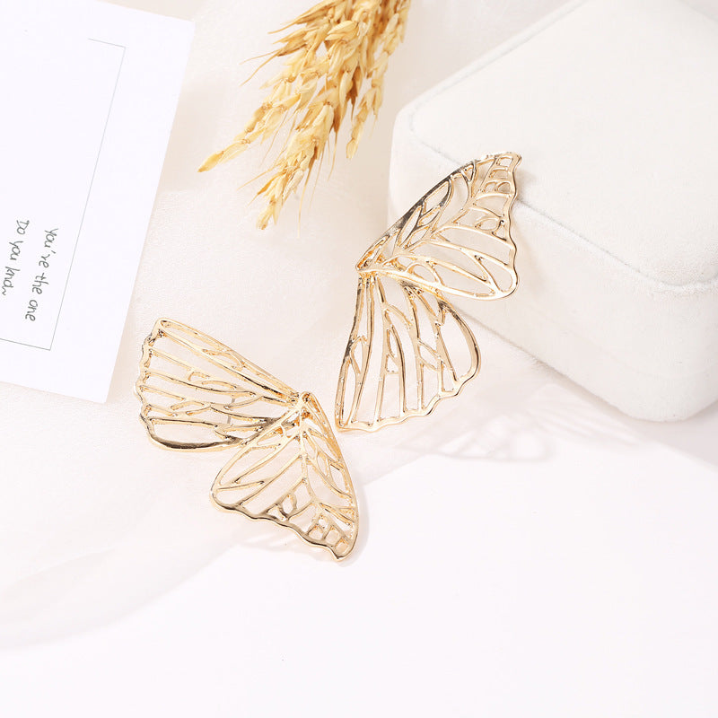 Boucles d'Oreilles Papillon Sculpté 26g Design Creux